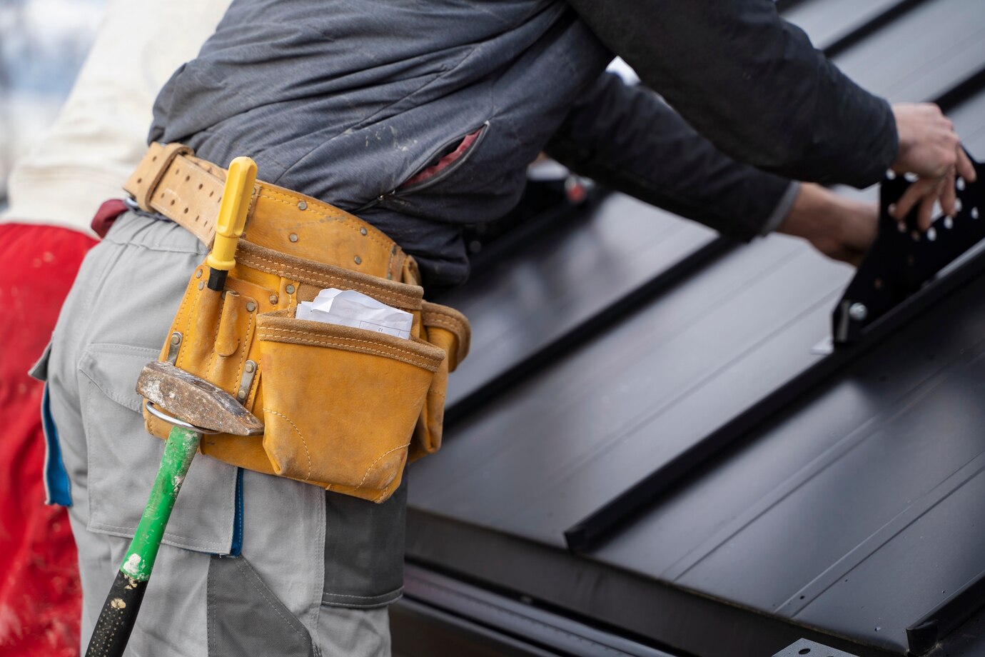 construction-worker-doing-his-job-with-belt_23-2149343658